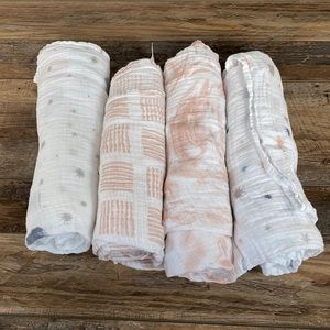 (4) swaddle blankets.